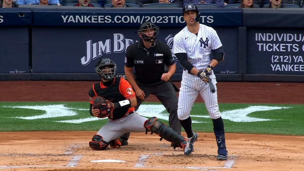 Giancarlo Stanton is standing after his 447-foot home run against the Orioles.
