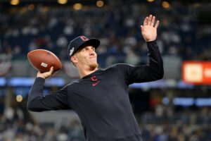 Myles Straw threw a football at Yankees fans.