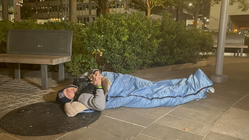 Brian Cashman is sleeping outside for a charity.