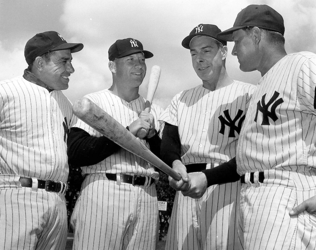 Ralph Houk, one the best Yankees managers, with Yogi Berra, Mickey Mantle and Joe DiMaggio in this file photo from March 9, 1961.