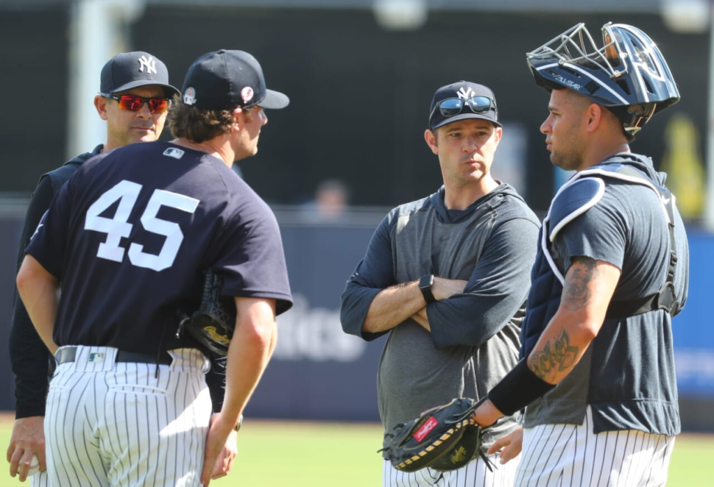 New York Yankees' Aaron Boone, Matt Blake, Gerrit Cole and catcher Gary Sanchez at Steinbrenner Field, Tampa, in 2020.