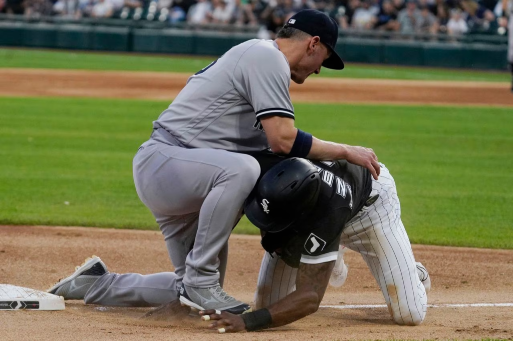 Chicago White Sox's Tim Anderson pushes Josh Donaldson to oust from in Chicago, Friday, May 13, 2022.