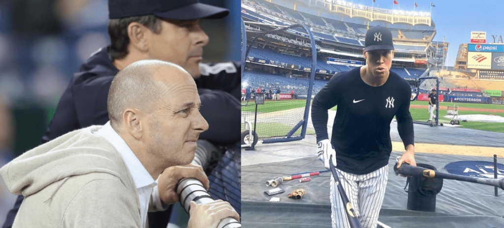 Brian Cashman looks and Aaron Judge after an workout session.