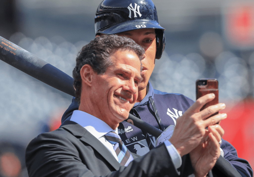 Yankees great Paul O'Neill is taking a selfie with Aaron Judge