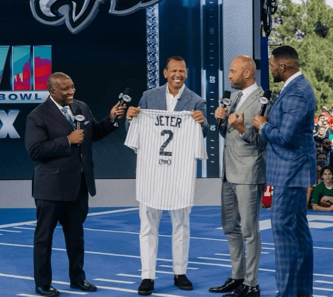 Alex Rodriguez present a No. 2 pinstripes to Derek Jeter after Fox Sports annpounced his hiring for its MLB broadcasting team, as David Ortiz and Curt Menefee on Feb 13, 2023.