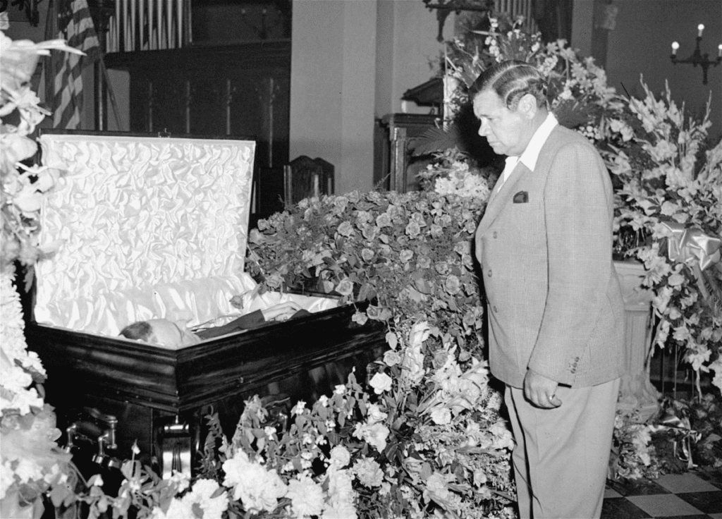 Babe Ruth paying his last respects to Lou Gehrig.