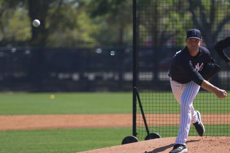 Mike King is pitching during a training session at Yankees spring training camp in February 2023.