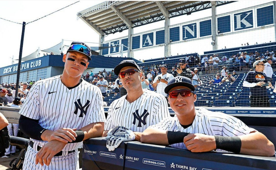 Aaron Judge, Stanton, and Anthony Volpe pose for a photograph during the Yankees 2023 spring training game at Tampa, FL.