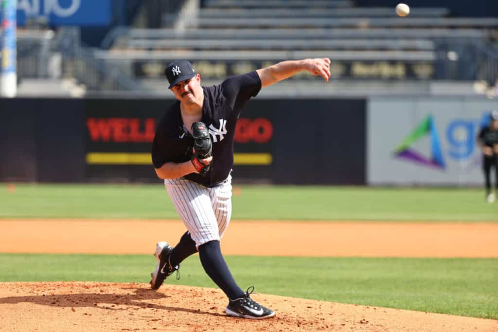 Carlos Rodon is pitching during a spring training session for the New York Yankees.
