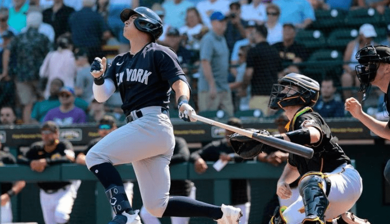 Anthony Volpe is hitting a home run against the Pirates during the Yankees spring training in 2023.