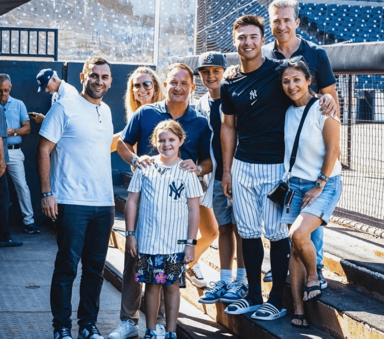 Anthony Volpe with his family soon after the Yankees opted for him for their Opening Day roster.