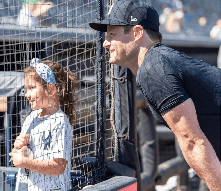 Ace Gerrit Cole is seen with a young fan at the 2023 Yankees spring training camp, Tampa, FL.