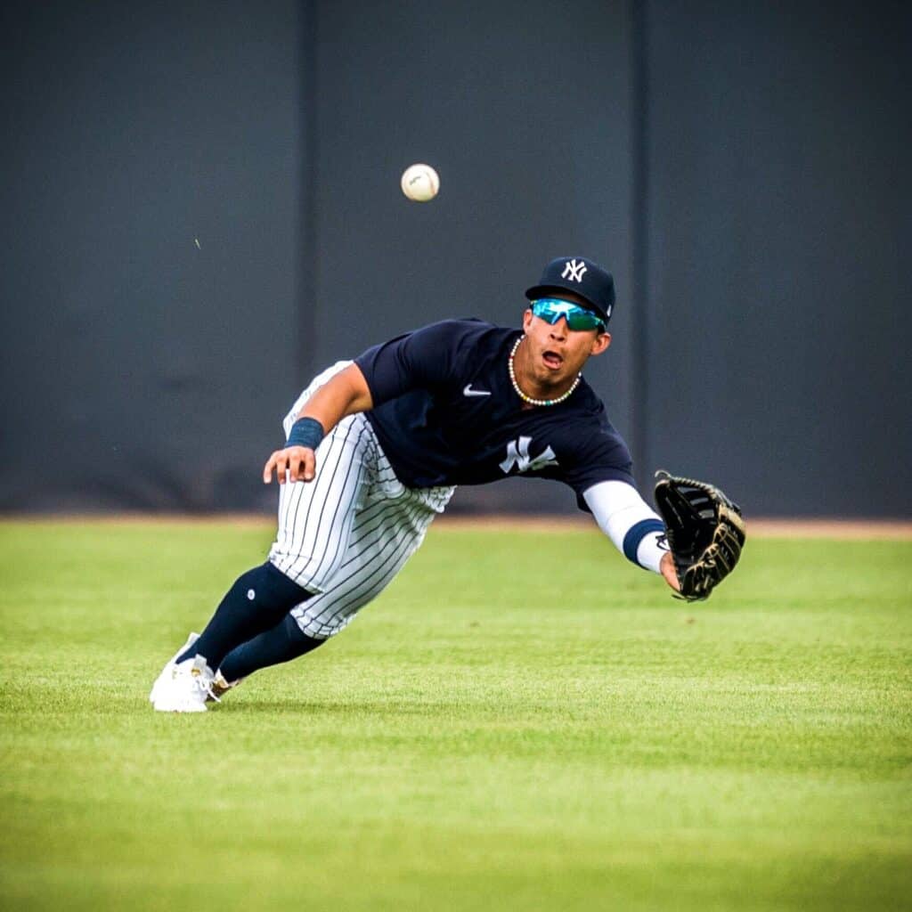 Oswaldo Cabrera is playing at Yankees shortstop during a 2023 spring training game.