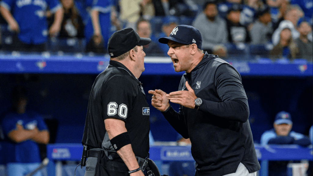 Yankees manager Aaron Boone is seen arguing with an umpire on April 12, 2023, at Progressive Field. It led to his 27th eviction.