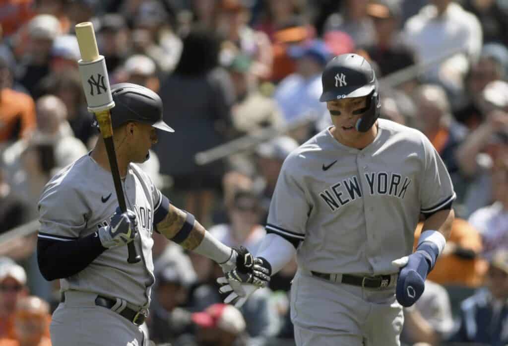 Aaron Judge celebrates with Giancarlo Stanton after two homers against the Orioles, Apr 09, 2023.