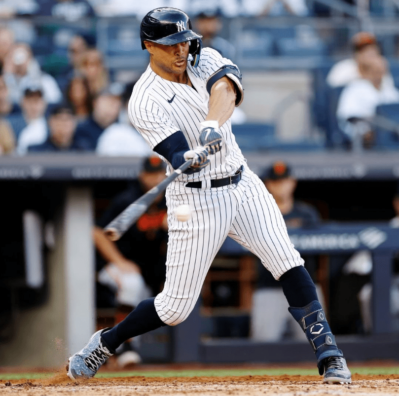 Giancarlo Stanton is looking at the ball after he hit a 485-feet long home run against the Giants at Yankee Stadium on April 2, 2023.