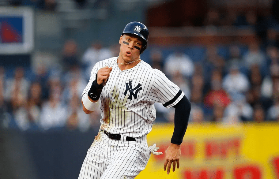 Yankees' Aaron Judge dashes to third base in the first inning against the Kansas City Royals at Yankee Stadium, Apr 18, 2019.