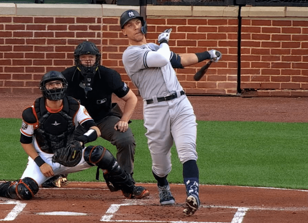 Aaron Judge is hitting a home run in Oriole Park at Camden Yards in a Yankees vs. Orioles game.