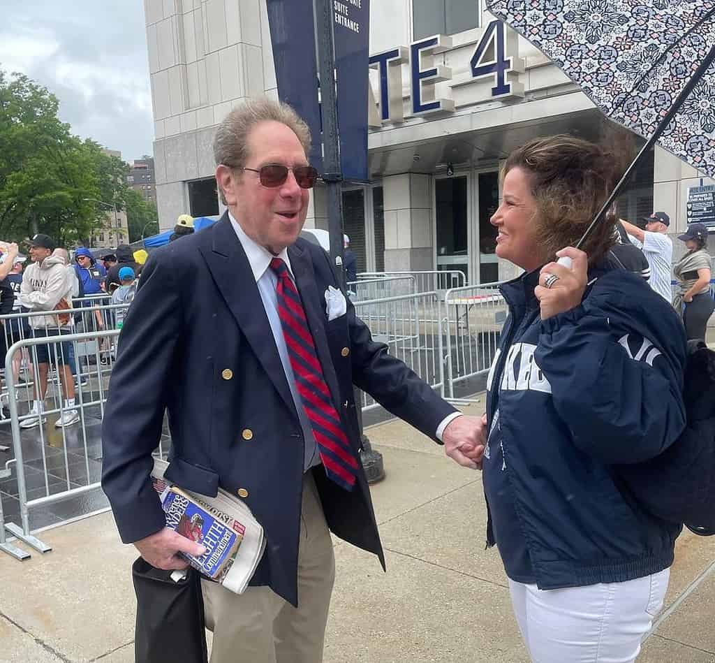 Yankees announcer John Sterling with a fan.