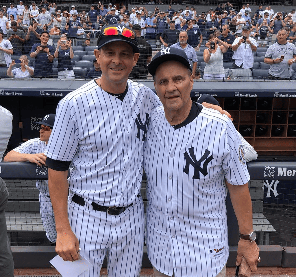 Yankees manager Aaron Boone with ex-manager Joe Torre at Yankee Stadium in 2018.