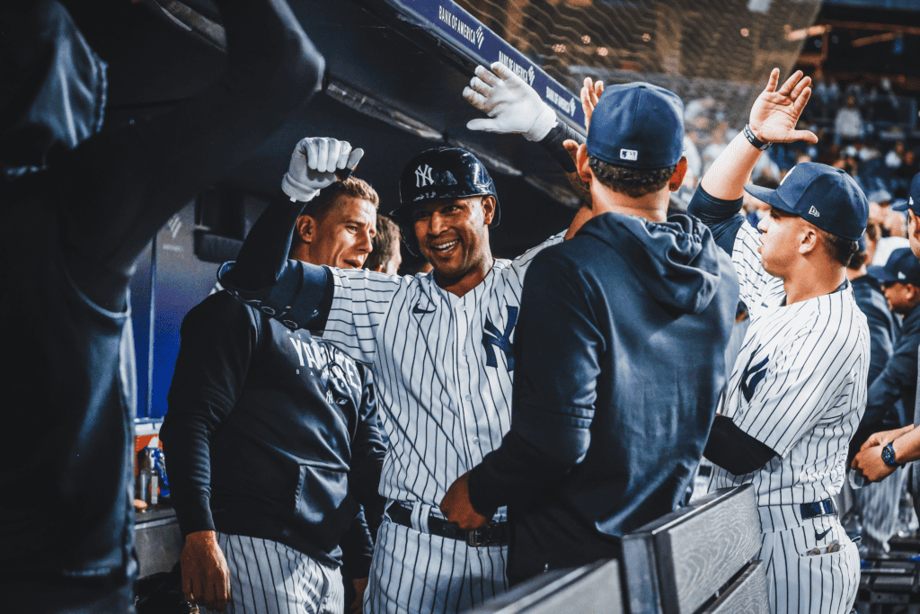 New York Yankees' Aaron Hicks is with his teammates after hitting a home run against Oakland at Yankee Stadium on May 8, 2023.