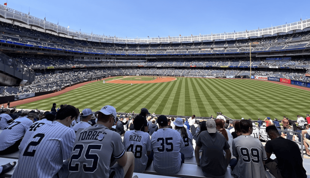Yankees fans are watching their team against the Athletics at Yankee Stadium on May 10, 2023.