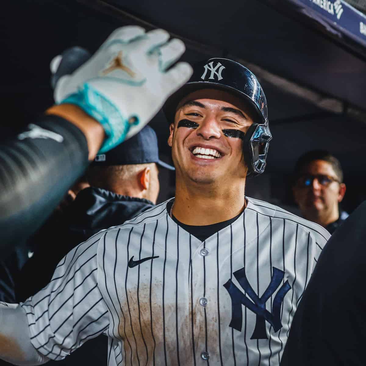 Anthony Volpe in Yankees dugout after hitting a grand slam against Oakland at Yankee Stadium on May 10, 2023.