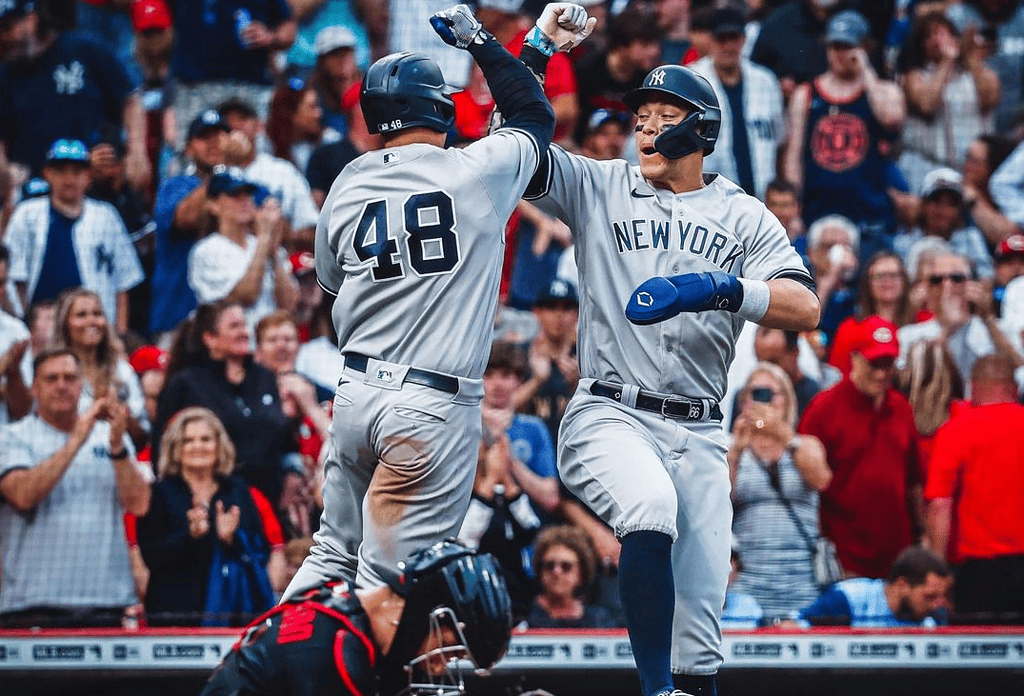 Aaron Judge and Anthony Rizzo celebrate against the Reds in Cincinnati on May 19, 2023.