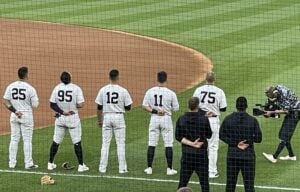 The New York Yankees players before the start of a game at Yankee Stadium.