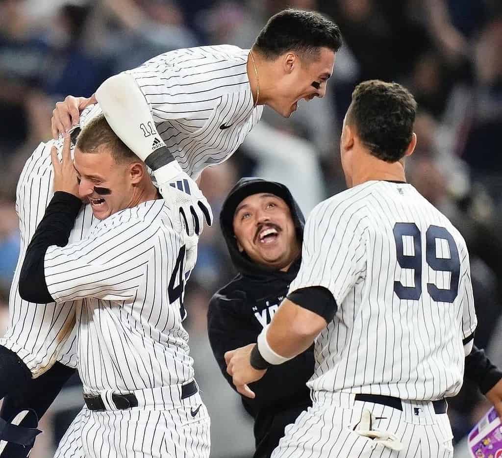 Anthony Volpe, Rizzo, Aaron Judge, and Cortes celebrates after the rookie shortstop Volpe drove in the winning run with a sacrifice fly in against the Orioles on May 23, 2023, at Yankee Stadium.
