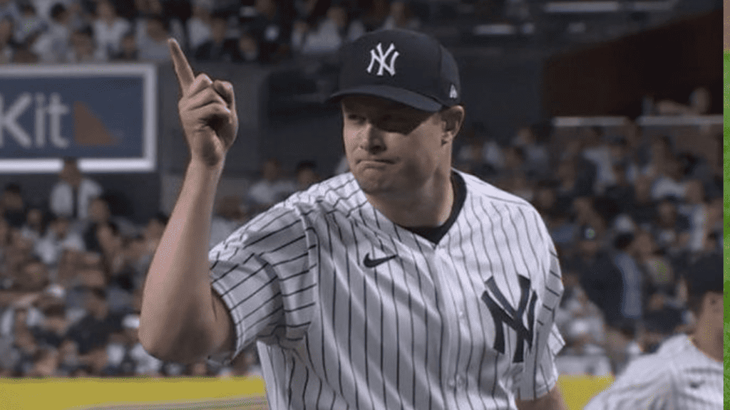 Yankees ace Gerrit Cole wags his finger at the Mariners dugout on June 20, 2023, at Yankee Stadium.