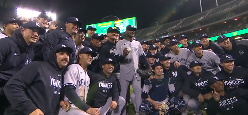 Yankees starter Domingo German with his teammates after he pitched a perfect game against the A's on June 28, 2023, at Oakland.