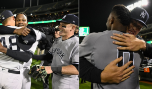 Anthony Rizzo, Harrison Bader, and Aaron Judge greet Domingo German after his perfect game against the A's on June 28, 2023, at Oakland.