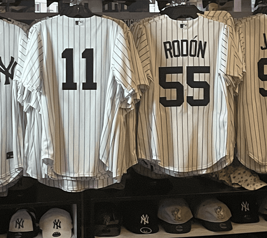 A store selling New York Yankees' jersey and caps.