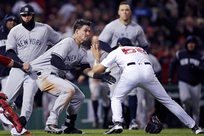 Yankees first baseman Tyler Austin and Red Sox relief pitcher Joe Kelly are in a fight on April 11, 2018, at Fenway Park in Boston.