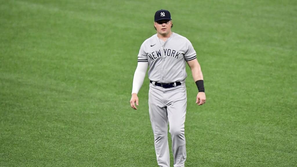 Former Yankees' player Voit walking on grass