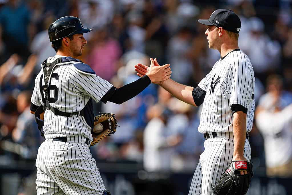 Yankees players in action during the game over the Texas Rangers, on sunday, June 25.