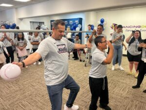 As part of the Yankees' 2023 Hope Week, Aaron Boone dances at Dancing Dreams with children having medical and physical challenges.