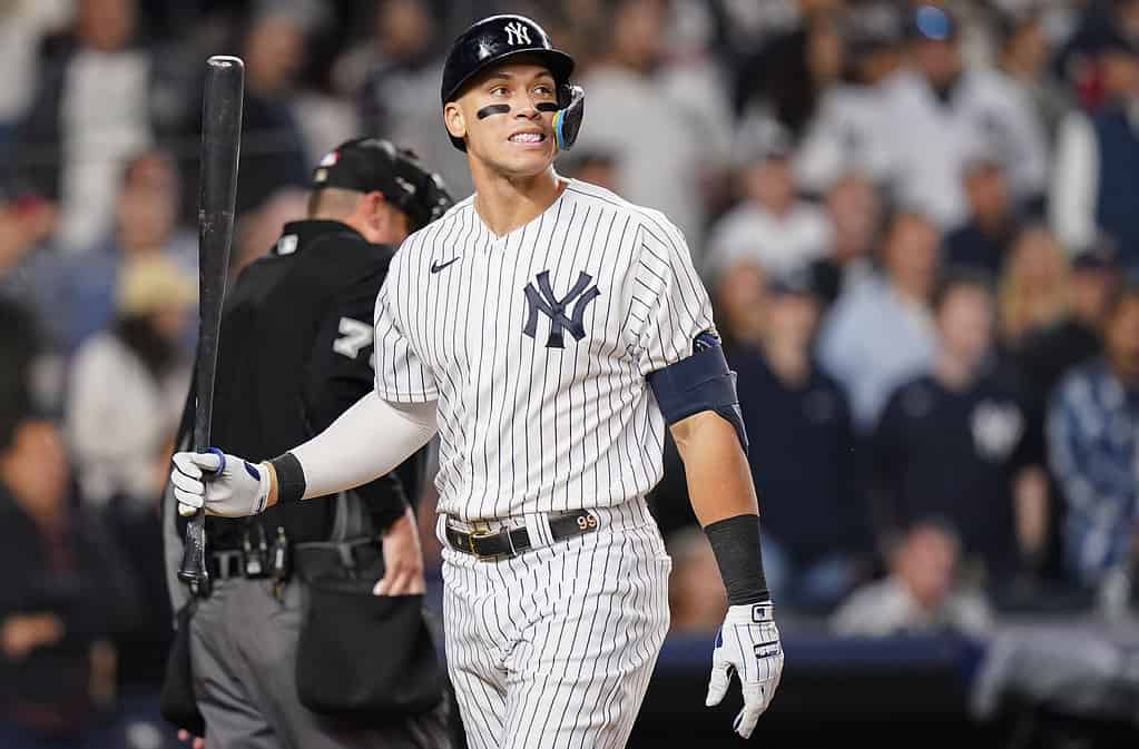 New York Yankees Aaron Judge walks back to the dugout after striking out against the Cleveland Guardians during the third inning of Game 1 of an American League Division baseball series, Tuesday, Oct. 11, 2022, in New York. 
