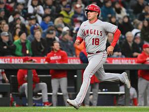 Apr 3, 2023; Seattle, Washington, USA; Los Angeles Angels first baseman Jake Lamb (18) scores a run off an RBI single hit by shortstop Luis Rengifo (2) (not pictured) during the fourth inning at T-Mobile Park.