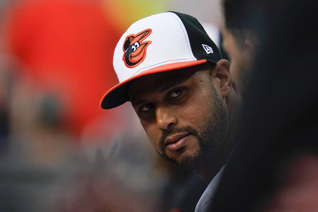 Baltimore Orioles outfielder Aaron Hicks sits in the dugout during the second inning of a baseball game against the Cleveland Guardians, Tuesday, May 30, 2023, in Baltimore.