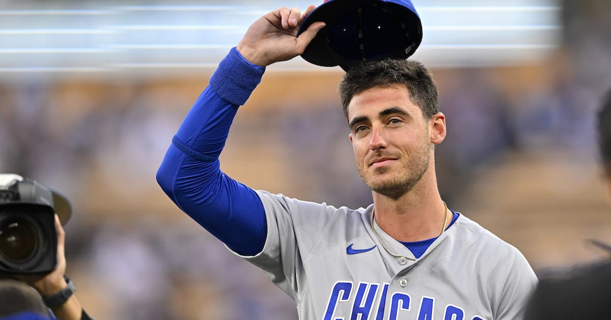 Apr 14, 2023; Los Angeles, California, USA; Chicago Cubs center fielder Cody Bellinger (24) acknowledges the crowd during a video tribute prior to the game against the Los Angeles Dodgers at Dodger Stadium.