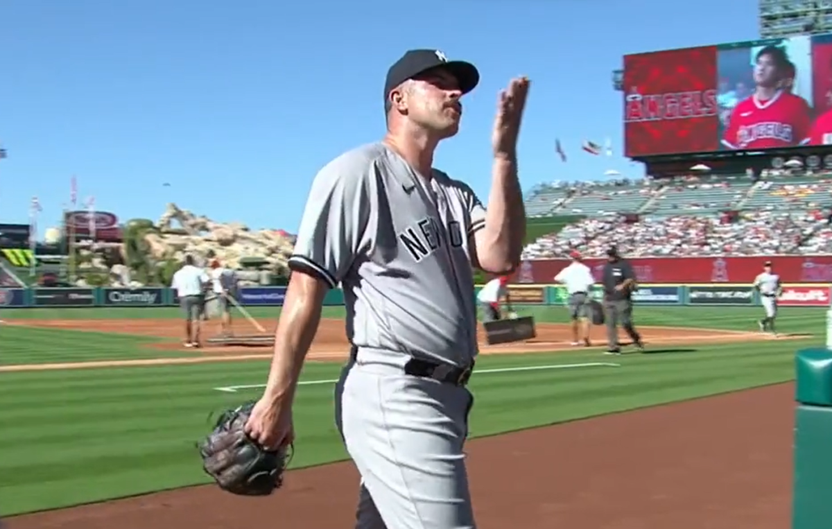 Carlos Rodon reacts to some Yankees fans in attendance.