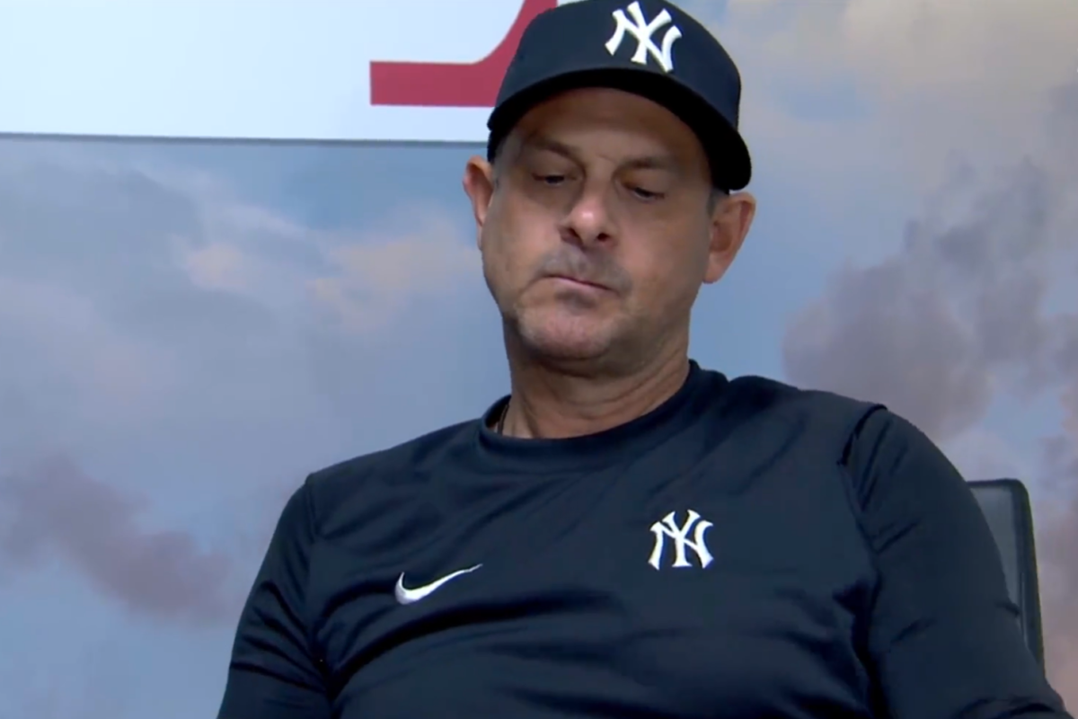 Yankees manager Aaron Boone talks to reporters after the Angels swept the Yankees with a win in Game 3 on July 19, 2023, at Anaheim.