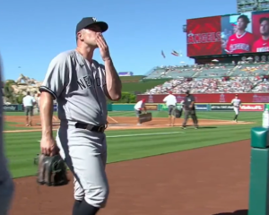 Carlos Rodon responds to boos by a Yankees fan by blowing a seemingly sarcastic kiss at them on July 19, 2023, at Angel Stadium.