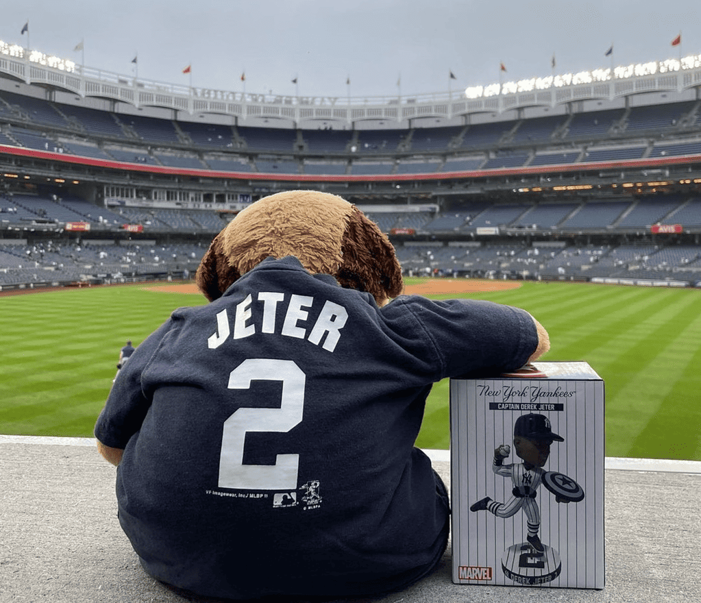 A Yankees fan shows Derek Jeter Captain America Bobblehead on Jun 23 at Yankee Stadium