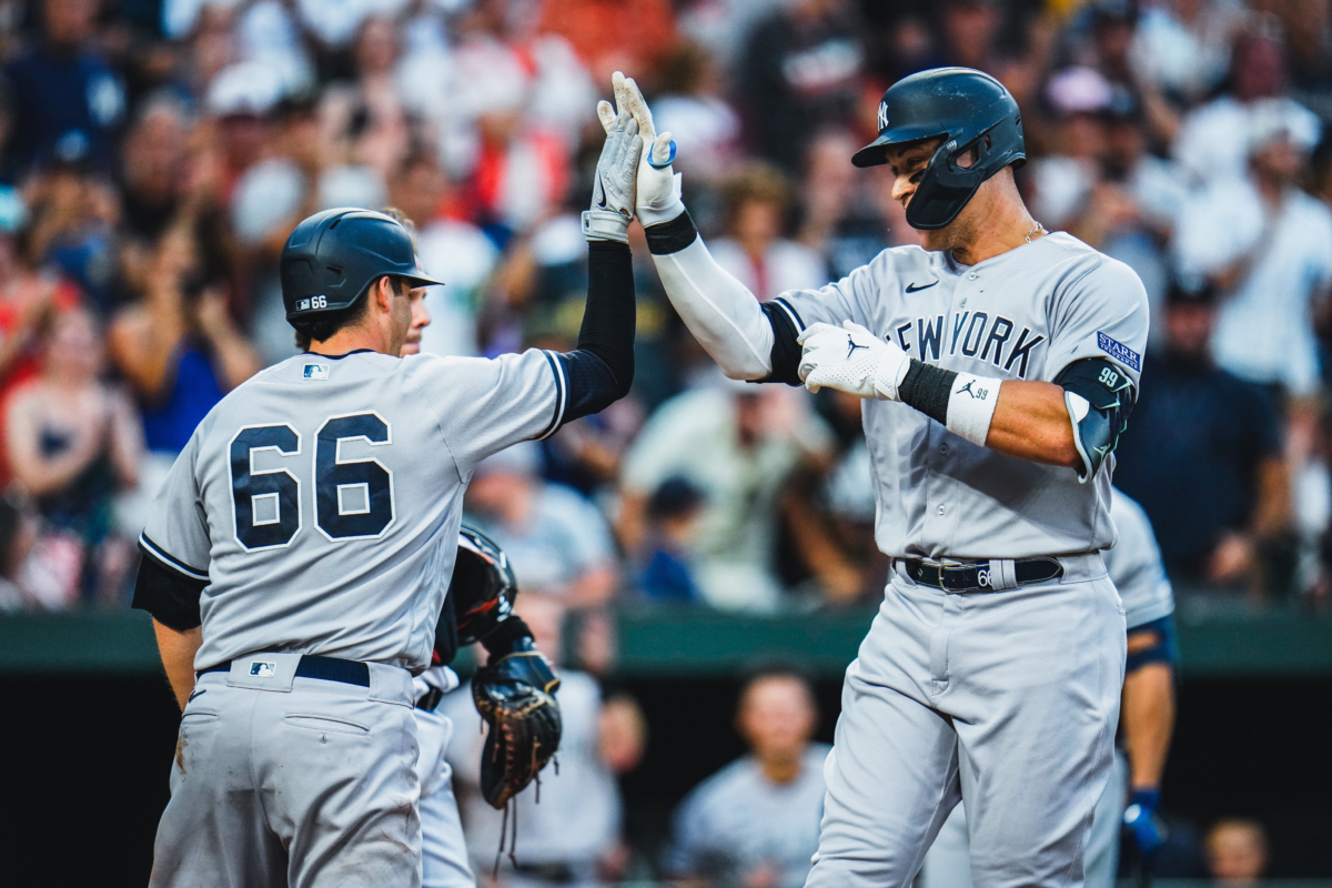 Aaron Judge and Kyle Higashioka celebrates as the Yankees beat the Orioles 8-3 at Camden Yards on July 29, 2023.