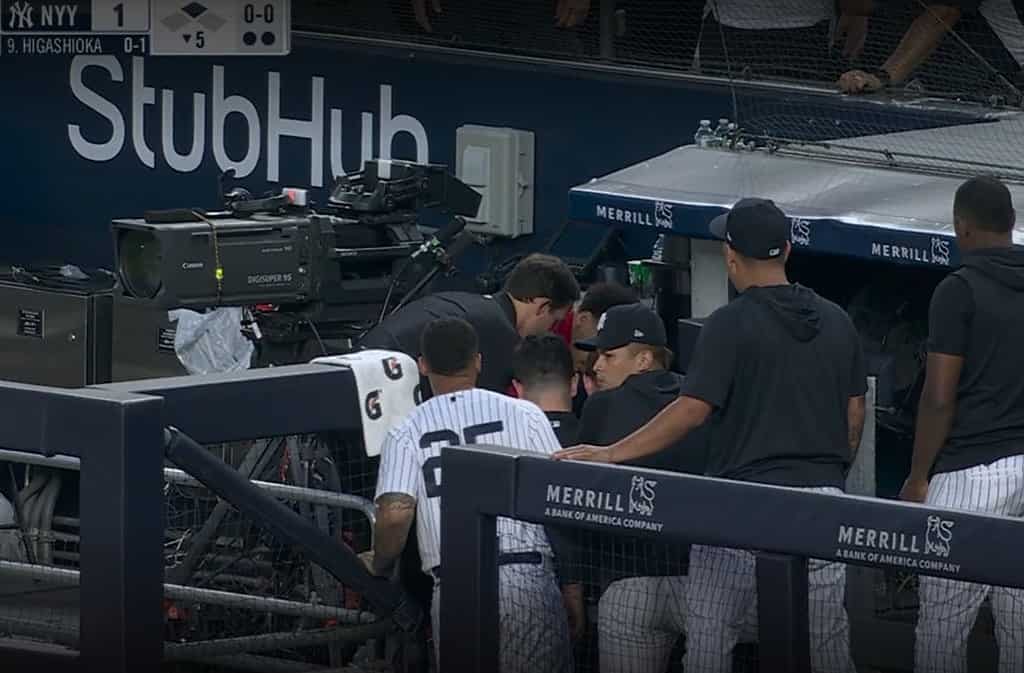 Cameraman stretchered off field after errant throw hits him in head at  Yankees game