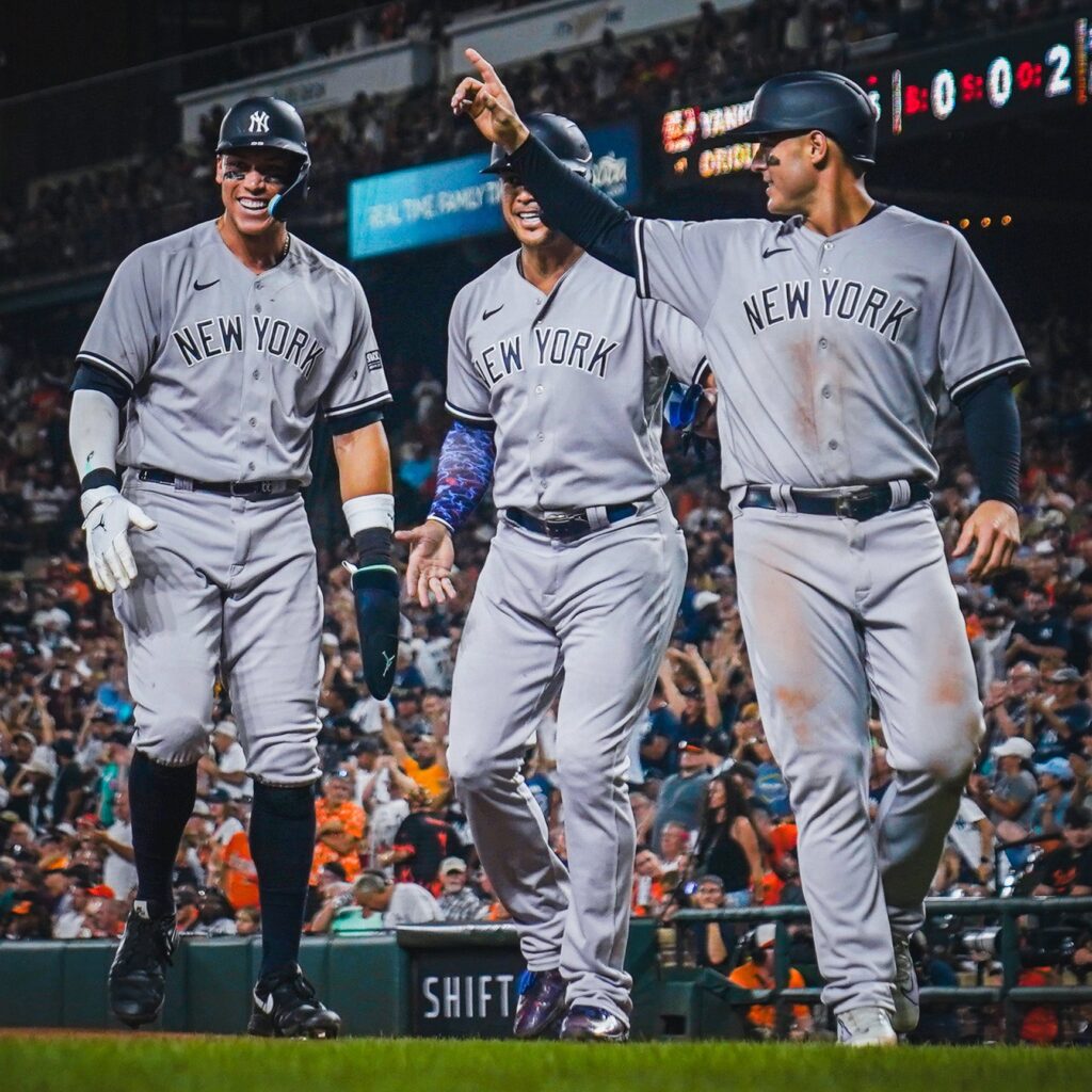 Aaron Judge, Giancarlo Stanton, and Anthony Rizzo celebrate after the Yankees beat the Orioles 8-3 in Baltimore on July 29, 2023.