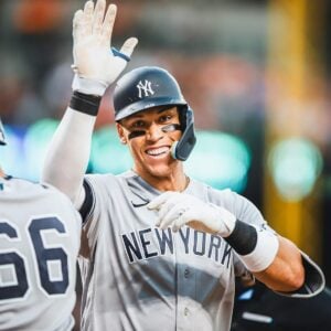 Yankees slugger Aaron Judge celebrates after hitting a home run in Detroit on August 28, 2023.